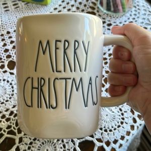 Rae Dunn Merry Christmas Mug, green on the inside and a wreath on the side.